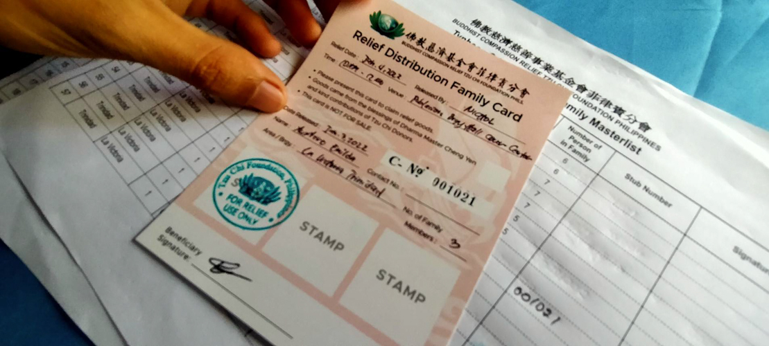 Beneficiaries receive a Tzu Chi Relief Distribution Family Card, which entitles them to claim aid. 