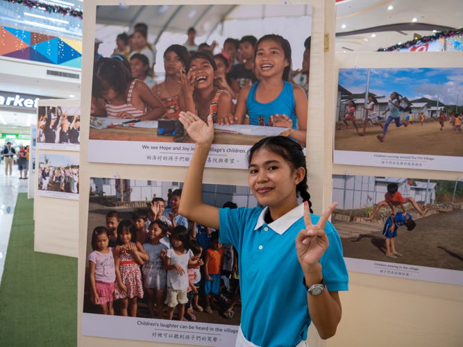 Trixie Mae Nazario Masocol was 8 when this photo of her was taken in a temporary classroom at the Tzu Chi Palo Great Love Village. Now 18, the BS Forestry major from Biliran   Province State University has been a Tzu Chi scholar since the 10th Grade. 【Photo by Matt Serrano】