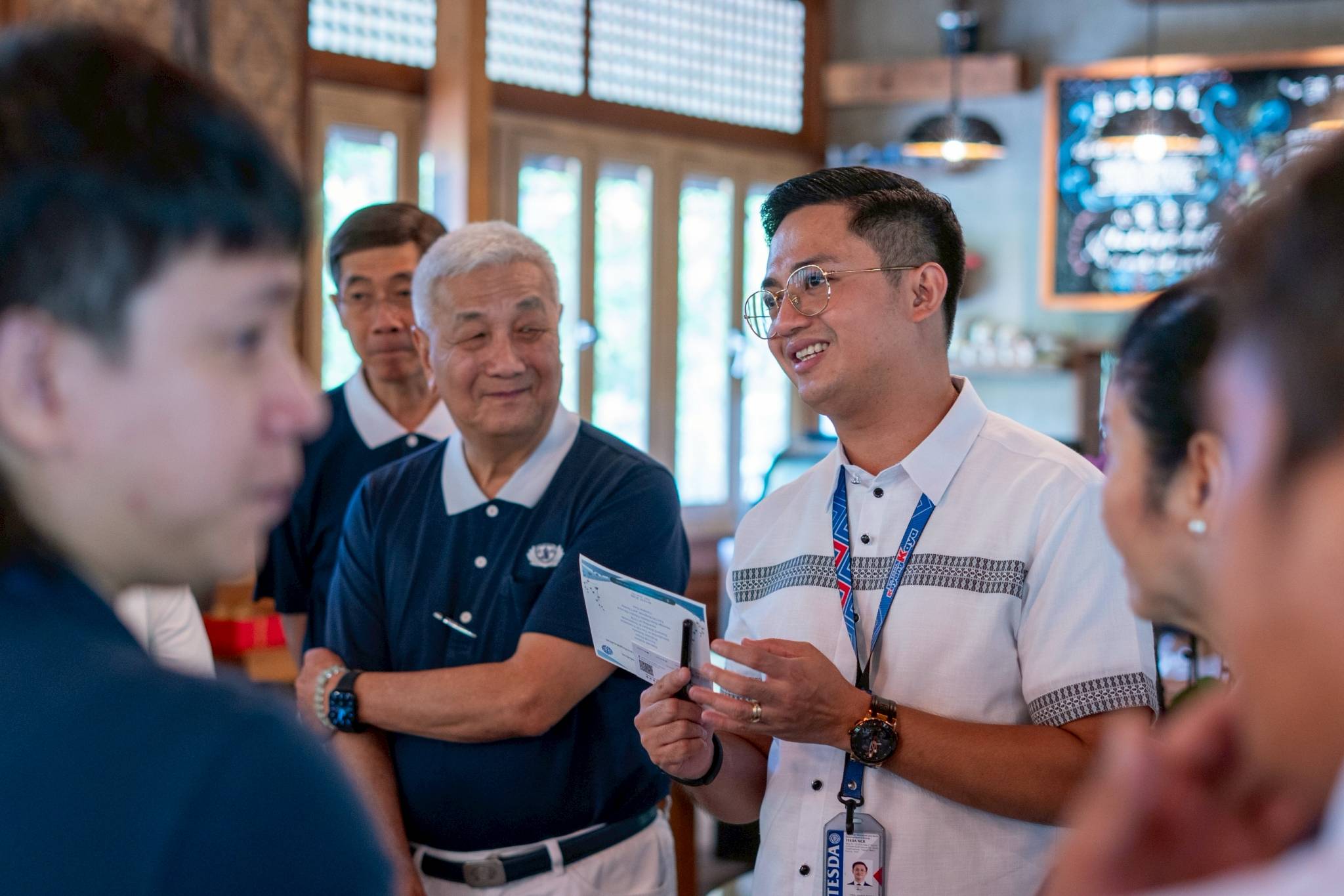 Tzu Chi Philippines CEO Henry Yuñez welcomes Paul John Ramos, director of TESDA’s Manila District, for the awarding of a Certificate of TVET Program Registration for the course on Welding Carbon Steel Plates & Pipes Using Shielded Metal Arc Welding (SMAW) offered by Tzu Chi’s Technical-Vocational Scholarship Program.