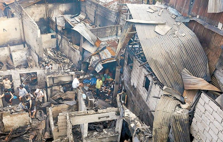 On November 28, a fire broke out in Barangay 310 in Sta. Cruz, Manila. (Source: Philstar Global)