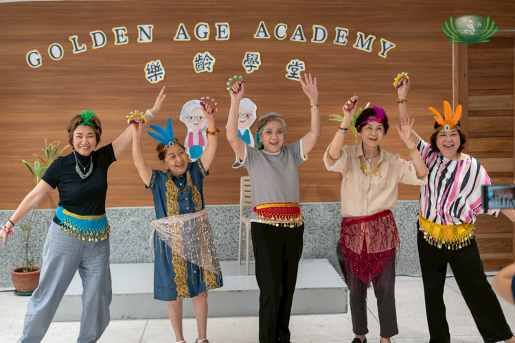 (From left) Lucy Co, Rosa Kho, Andrea Ong, Juanita Yap, and Vivian Go gamely don costumes in a group singing and dancing activity.