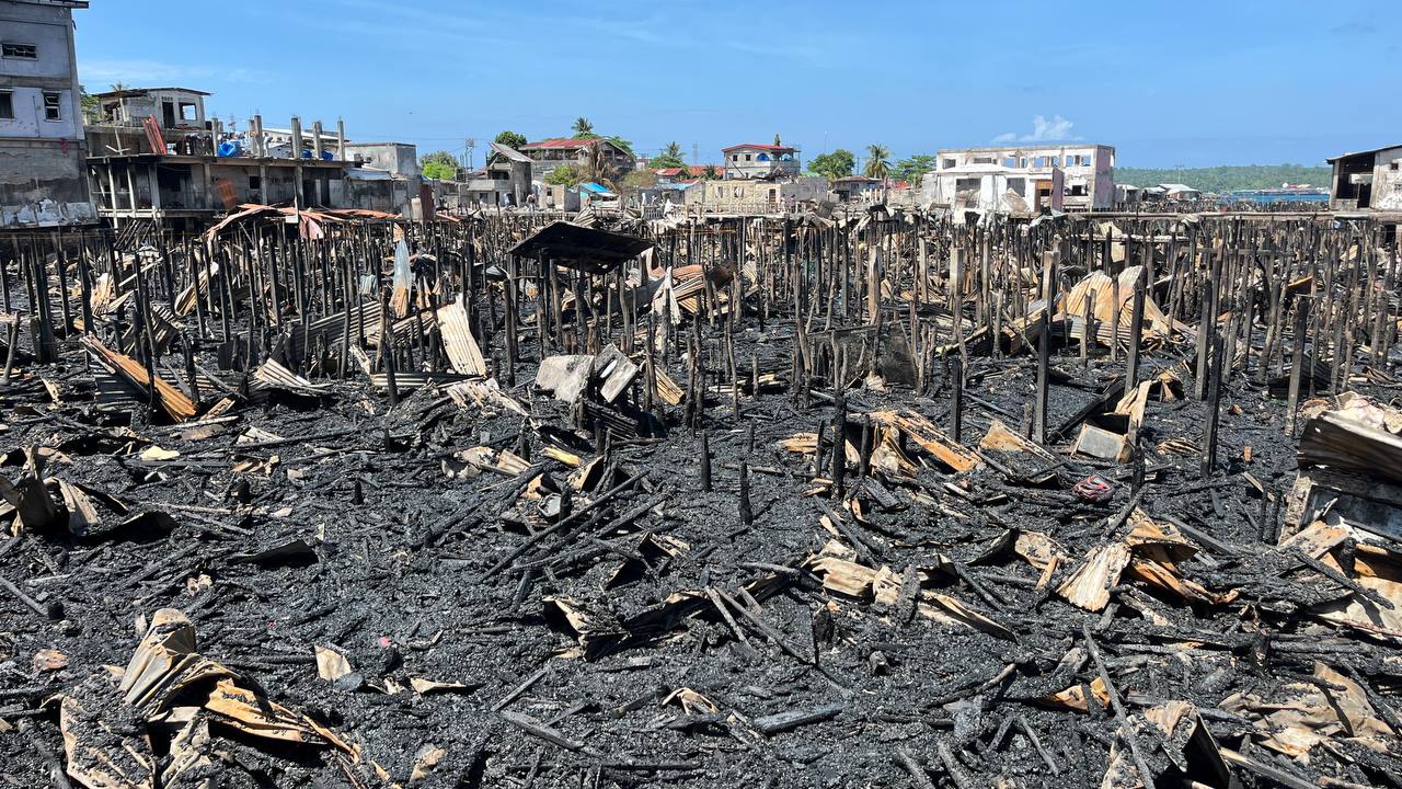 Days after the fire, only ash and debris remain where homes once stood. 