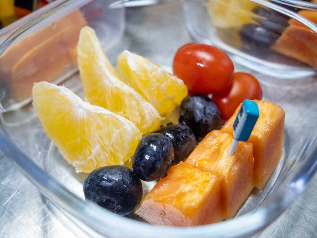 Fresh fruits are served during mealtime.