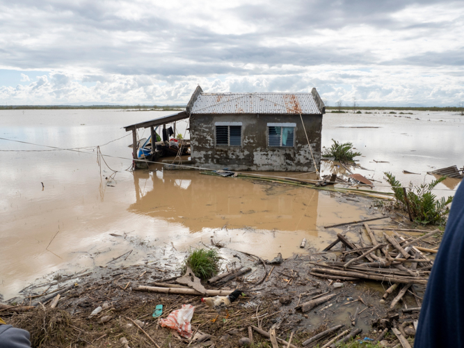 In Bisagu, some houses remain submerged in flood days after the typhoon. 