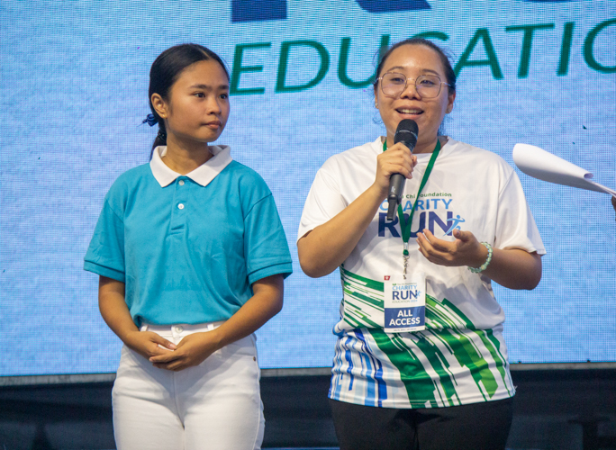 The author (left) and Tzu Chi Scholar alumna Cherrie Rose Ang give testimonials about life as a scholar of the foundation.