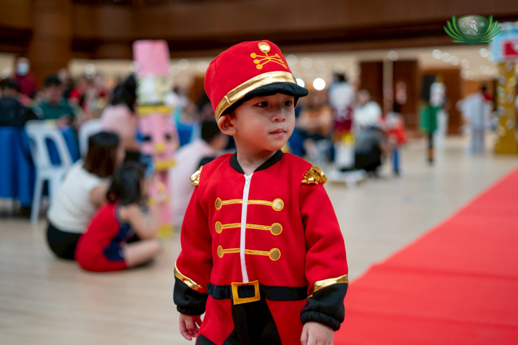 Nursery students dressed in Nutcracker costumes paraded on the red carpet with confidence.