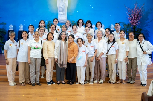 Members of Brahma Kumaris take a happy photo after the successful event.