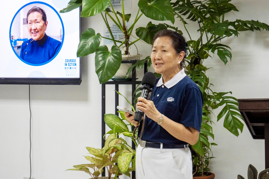 “I hope that with your [purple blue] shirts later on, you will be empowered and motivated to do tasks that a Tzu Ching is doing,” says Tzu Chi volunteer Sally Yuñez.