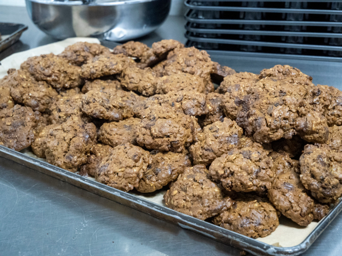 These are no ordinary cookies, but chocolate chip cookies made with love–not just a love between parents and their children, but a love for people in need.  