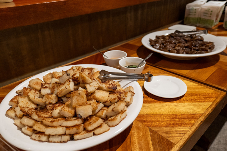 Traditional Lunar New Year delicacies, including radish cakes and sweetened rice cakes, offer guests a taste of cultural heritage at the BTCC's coffee shop.