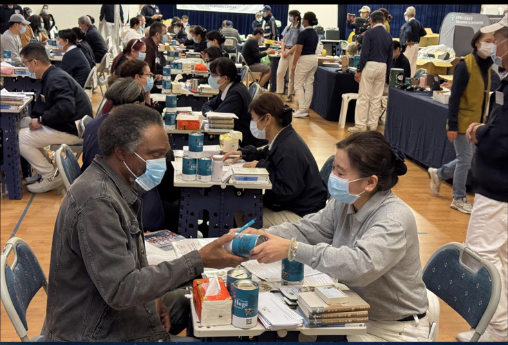 At Tzu Chi California’s relief efforts for victims of the LA wildfires in February, Minette Sy Chan (right) was part of the intake group, whose task was to sit with fire victims and offer comforting words as well as messages of hope from Master Cheng Yen. (Photo courtesy of Minette Sy Chan)