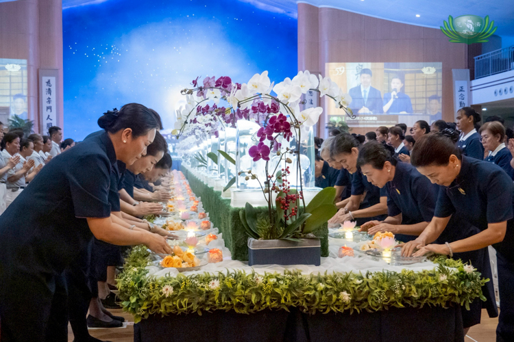 At the Buddha Bathing ceremony, everyone participated in the ritual of cleansing and purification, by dipping their fingers in a bowl of water then picking a flower.