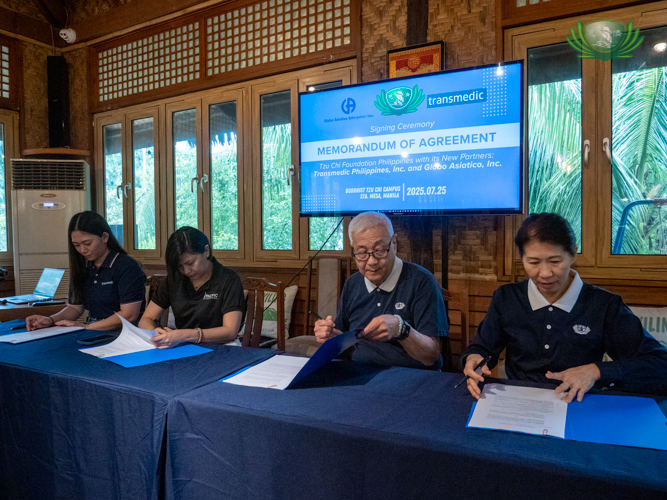 Tzu Chi Philippines and Transmedic Philippines sign the Memorandum of Agreement for patient support through the Medical Assistance Program. Transmedic Philippines is represented by  Anna Marie Marcelino (second from left), district sales manager, and Mary Reika Ishi (first from left), product specialist.