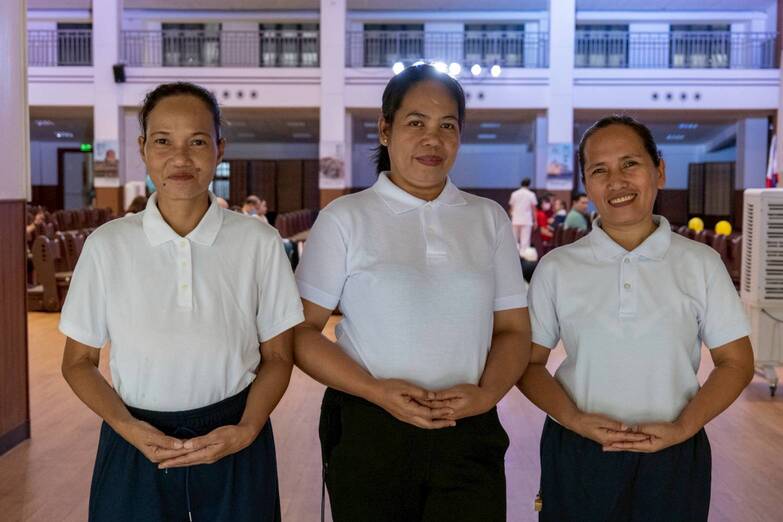 (From left) Nursery and pre-kindergarten aides Ate Romela Castillo, Ate Analiza Apuyan Sibayan, and Ate Teresa Mina assist teachers in looking after the students.