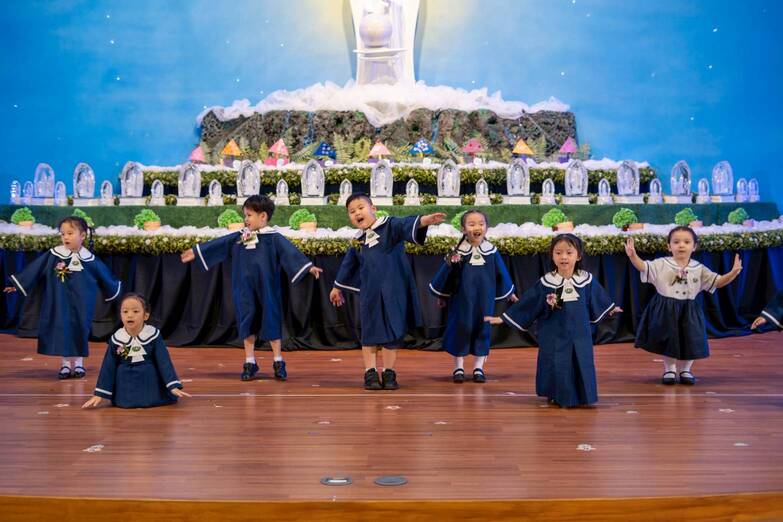 Pre-kindergarten students dance to the song “When Can I See You Again?”