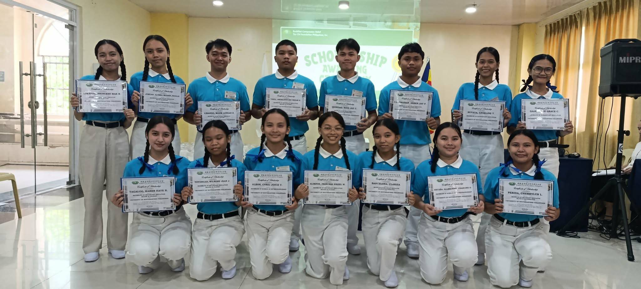 In Tzu Chi Davao, 15 new scholars proudly receive  their certificates of scholarship as Tzu Chi expands its educational support in the region.