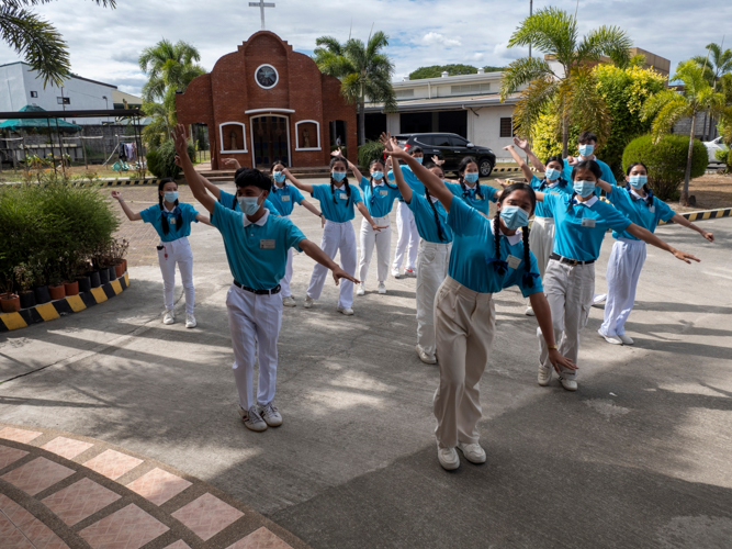 Tzu Chi scholars bring holiday cheer through their signature Christmas carol performance.