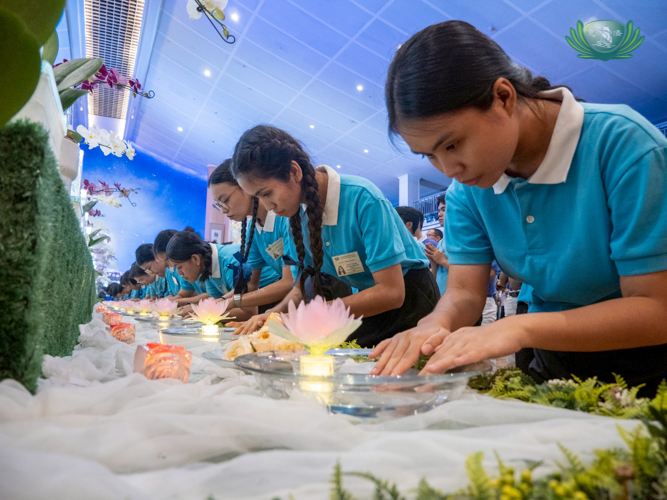 At the Buddha Bathing ceremony, everyone participated in the ritual of cleansing and purification, by dipping their fingers in a bowl of water then picking a flower.