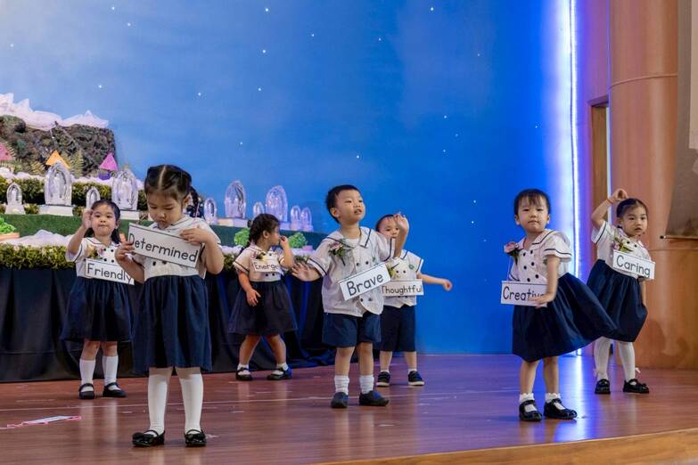 Nursery students dance to the song “We’re On Our Way.”