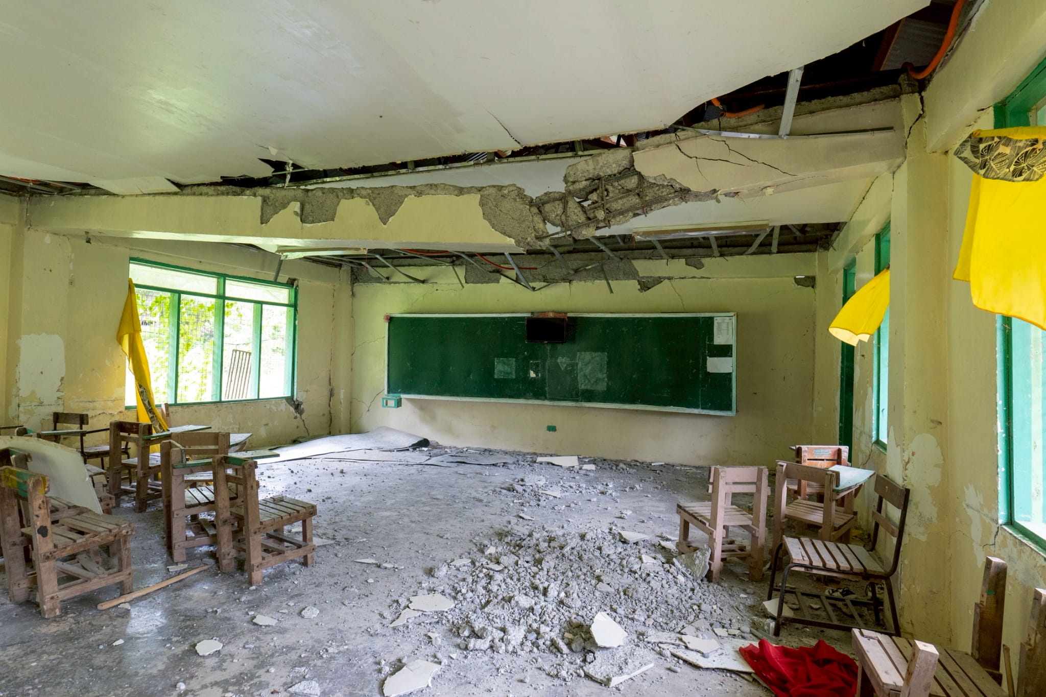 The walls and ceilings of several classrooms collapsed. 