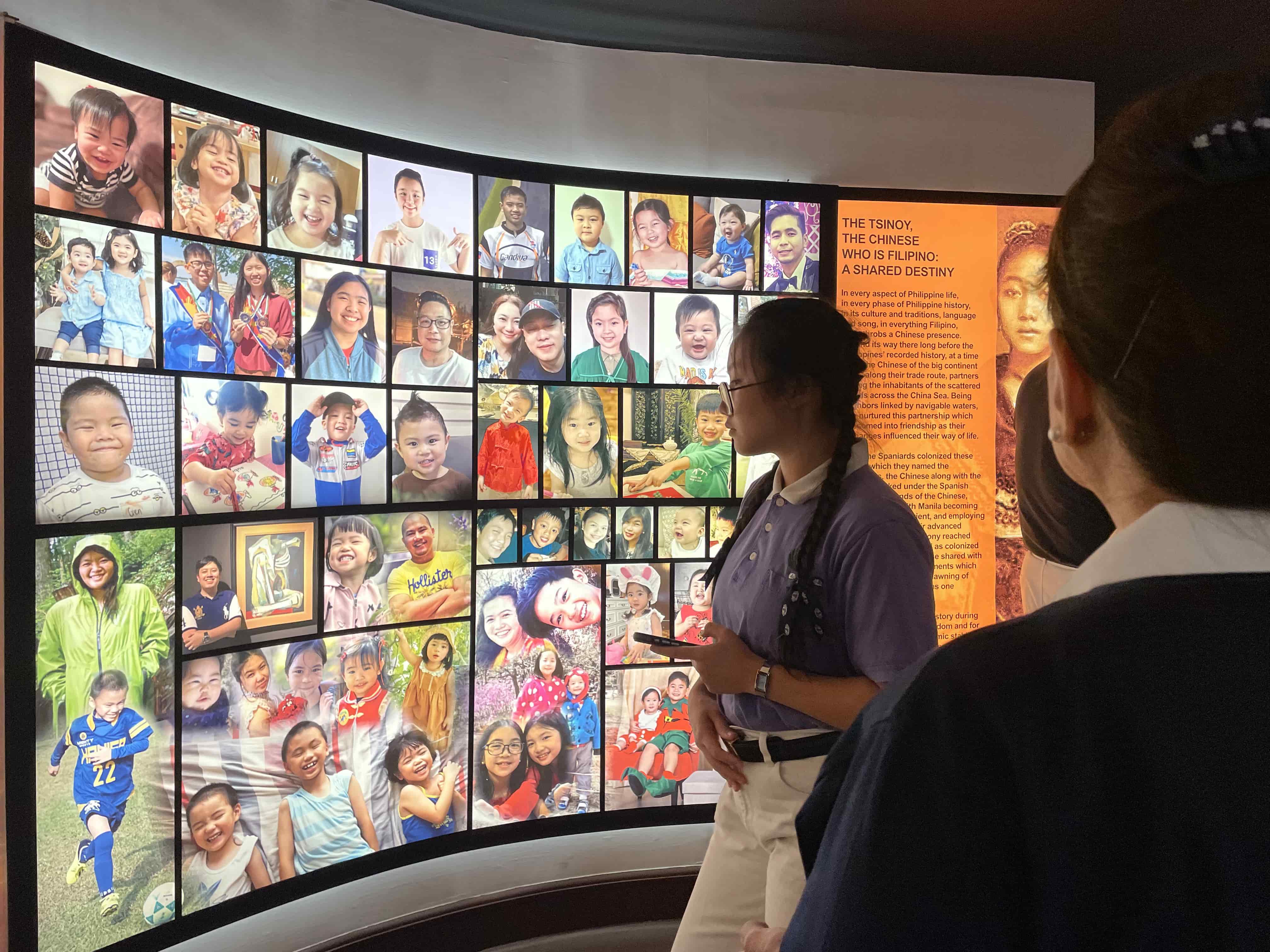 Looking over portraits of Filipino Chinese 
