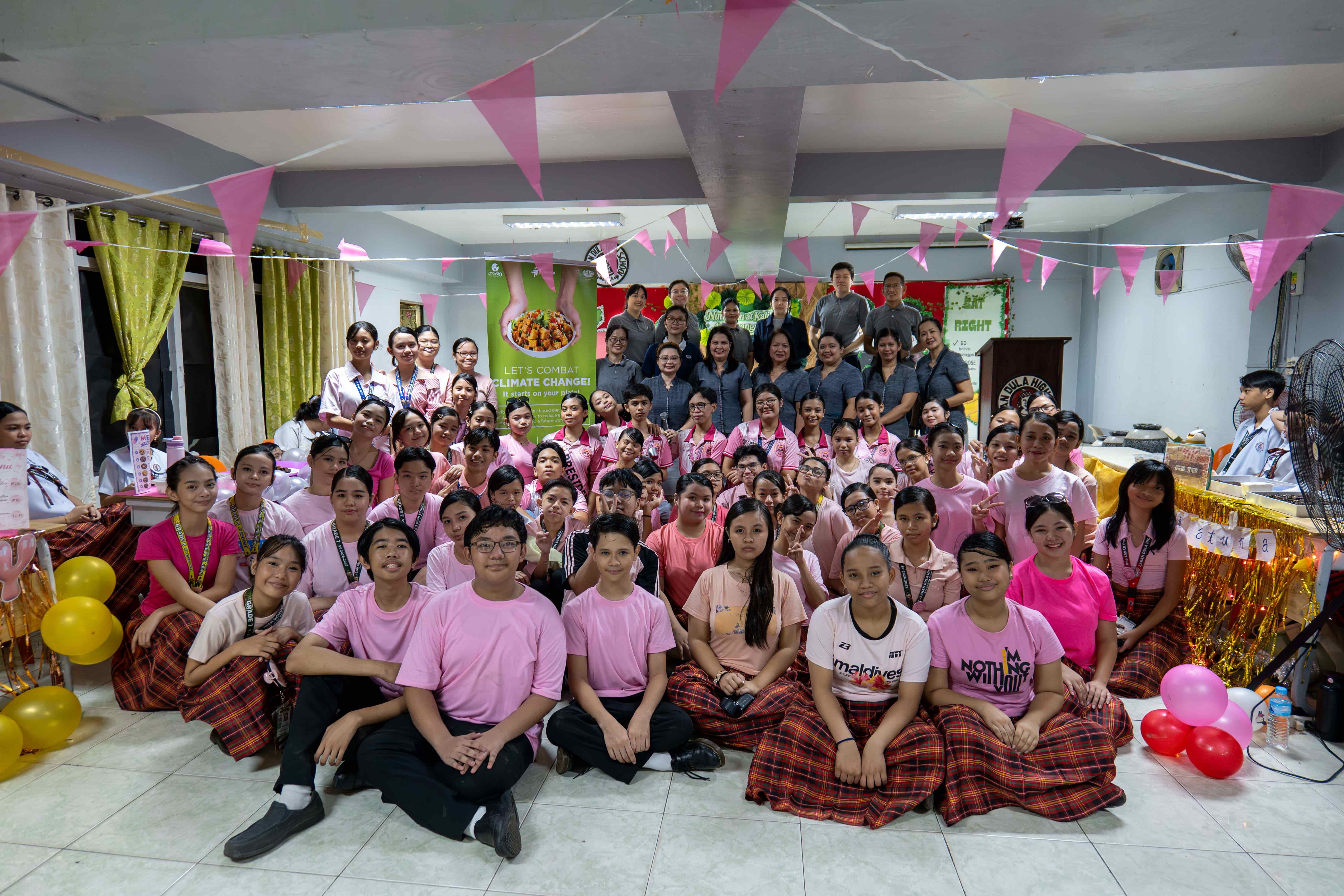 Tzu Chi staff and volunteers join LDHS teachers, student leaders, and learners for a group photo, marking the successful launch of Veg-Up! at the school.