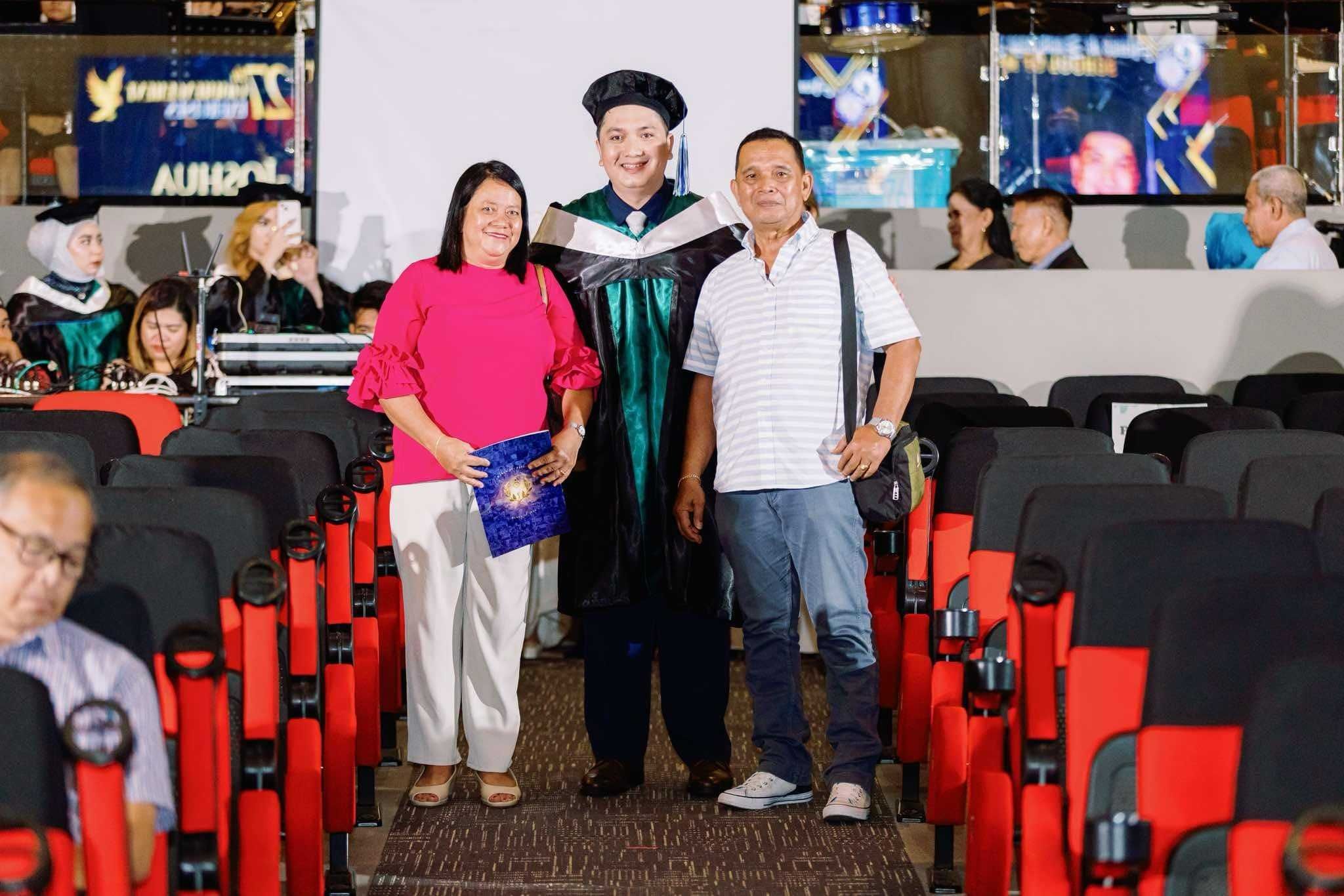 Edil-Joshua Ganas with his family, all smiles during his graduation. In his life, they are his greatest cheerleaders.