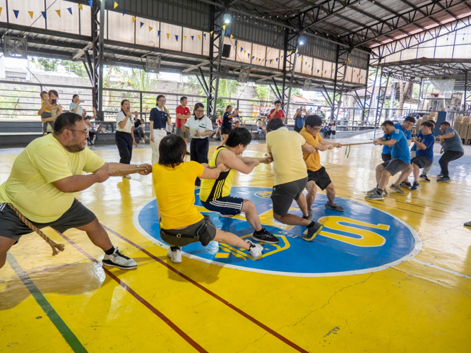 Teams put their best effort in the game of tug-of-war.