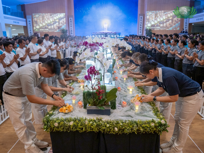 At the Buddha Bathing ceremony, everyone participated in the ritual of cleansing and purification, by dipping their fingers in a bowl of water then picking a flower.