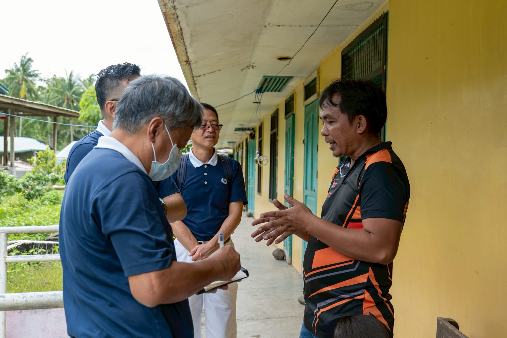 VLIS Principal Peter Lito Piquero (right)provides the number of functional classrooms and identifies those that could no longer be salvaged.
