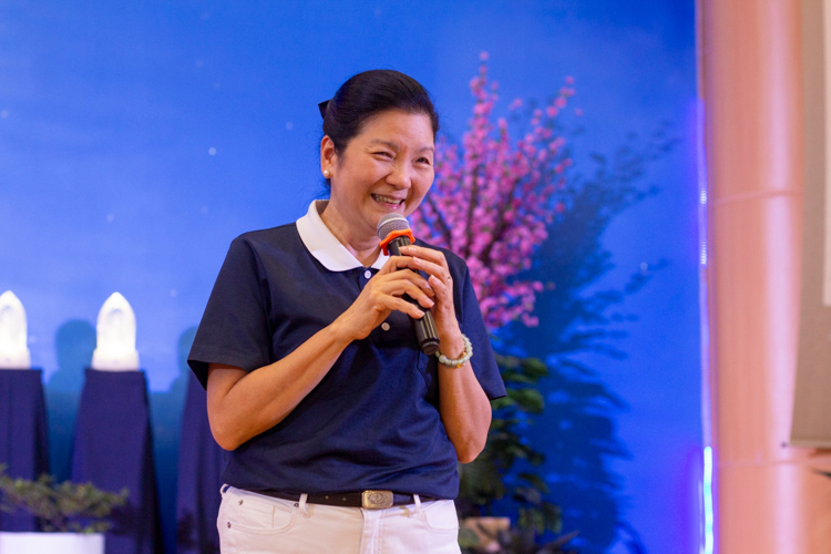 Overcome with happiness, as she celebrates her birthday on the same day as the symbolic graduation ceremony, Tzu Chi Education Committee Head Rosa So encourages the graduating scholars to volunteer with the foundation. “Don’t ever think that you need money to help another person. Time is very important.”