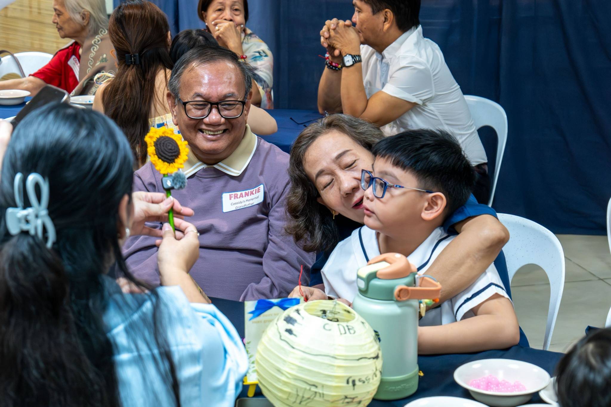 The grandparents enjoyed the moment just as much as the children did.