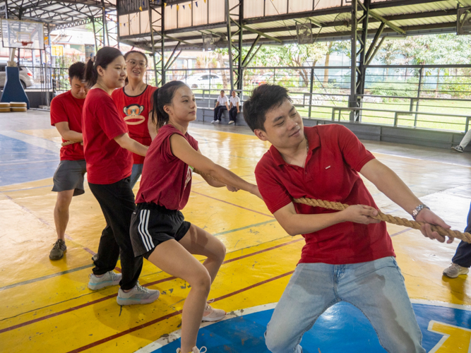 Teams put their best effort in the game of tug-of-war.