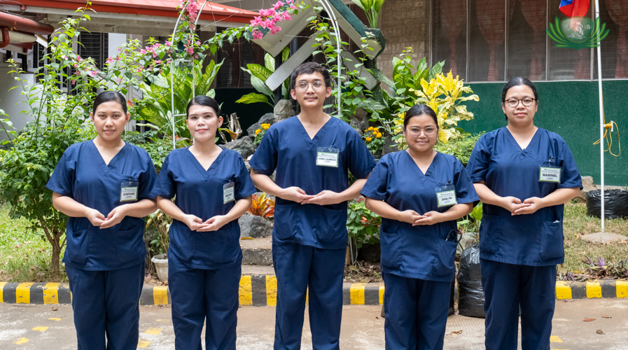 Tzu Chi caregiving scholars Marinel Acerden, Jenelyn Militar, James Llenos, Melissa Pederre, and Melissa Cayabyab (from left to right) pose for a memorable photo, marking an end to their meaningful on the job training.