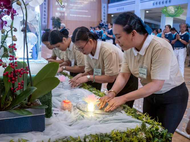 At the Buddha Bathing ceremony, everyone participated in the ritual of cleansing and purification, by dipping their fingers in a bowl of water then picking a flower.
