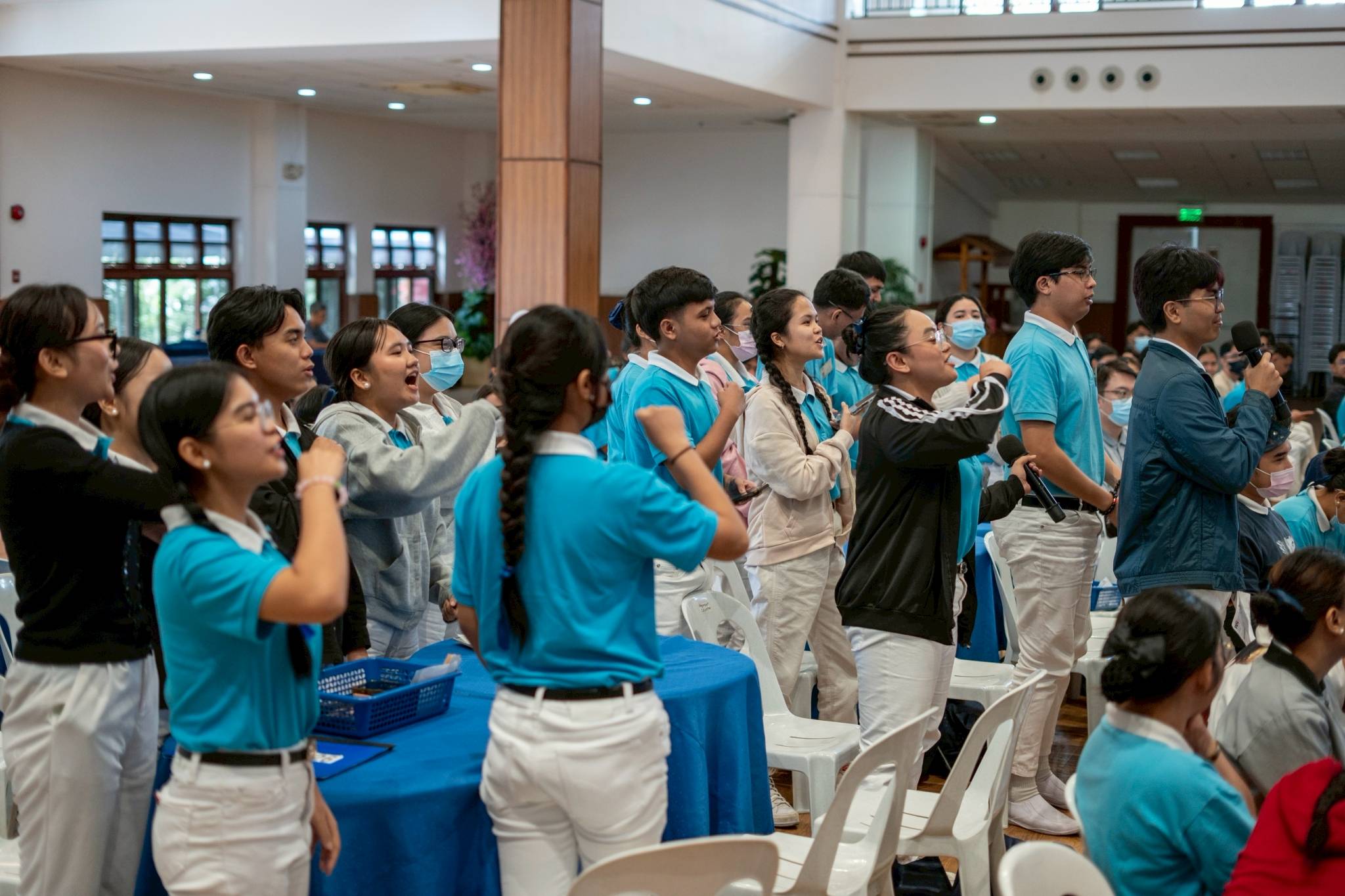 Tzu Chi scholars take turns performing their advocacy chants. 