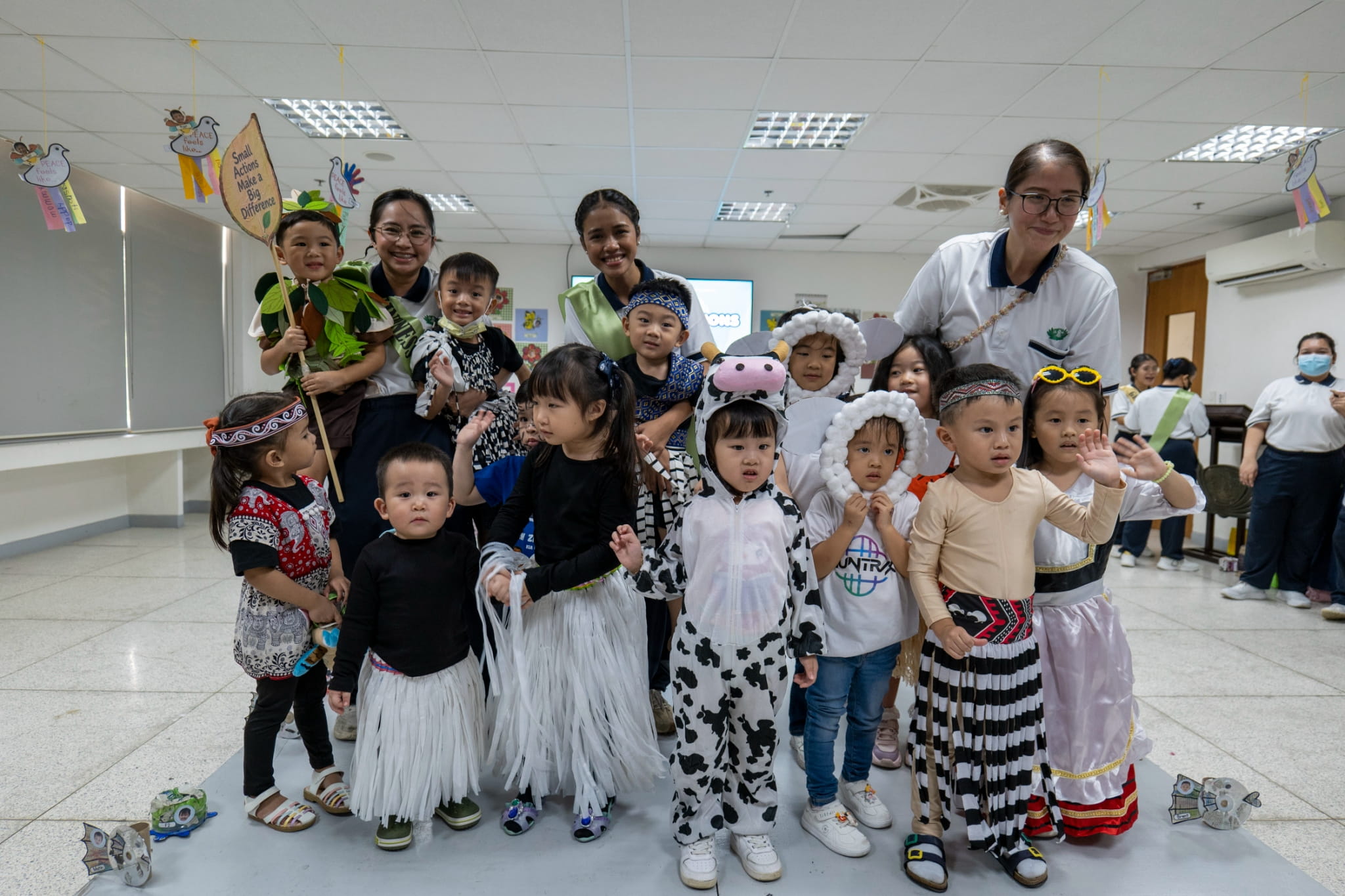 Pre-kindergarten learners showcase Māori-inspired costumes of New Zealand.