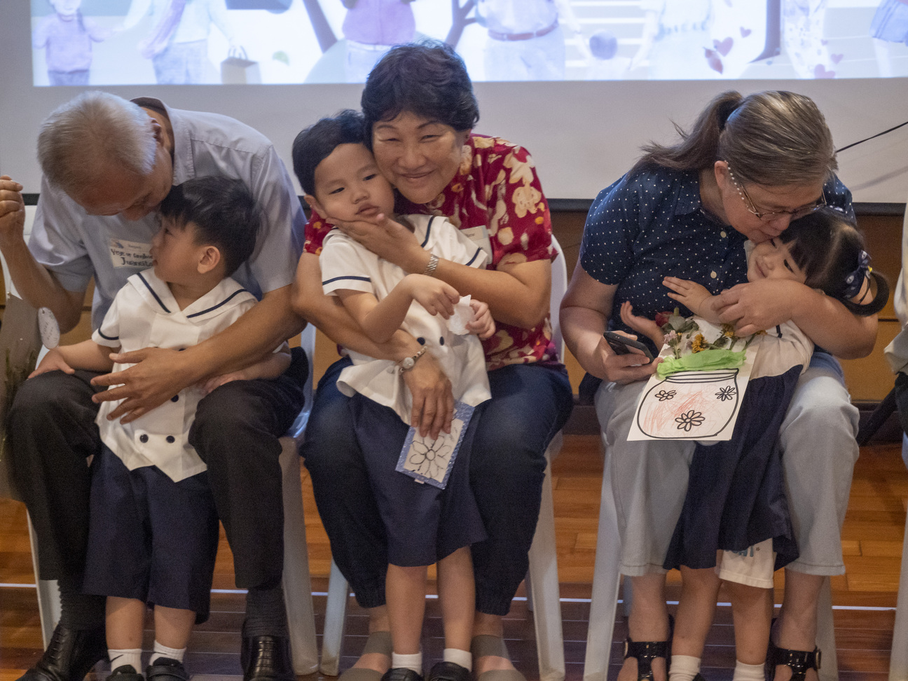 Each grandparent shares a memorable moment with their grandchild. 