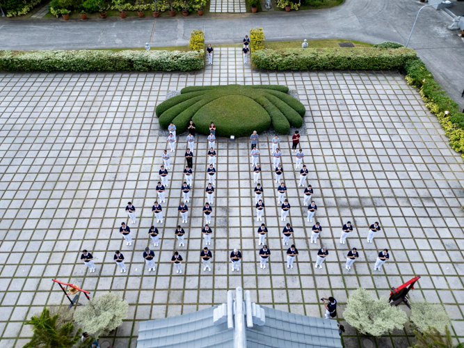 As dawn breaks after the evening ceremony, Tzu Chi volunteers and guests participate in a walking meditation at the BTCC, embracing mindfulness to start the New Year.