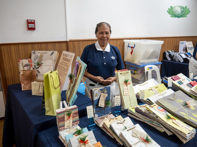 At the Jing Si Auditorium: Waste to Wonder wallpaper scraps are upcycled into gift bags.