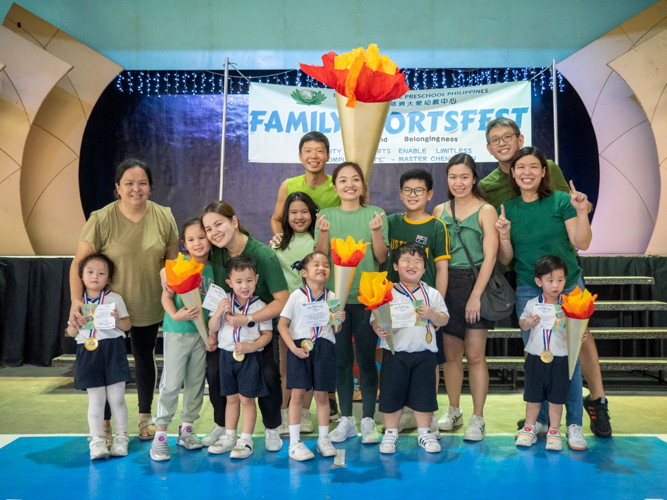 Team Green Warriors celebrate their win as champions, acquiring the most wins throughout the games.