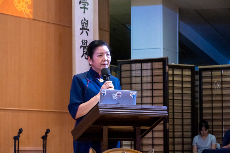 Tzu Chi Education Committee Head Rosa So presents a case study on John Welter Manayaga and Jean Myca Manayaga, twins who were awarded with Tzu Chi scholarships in 2024.