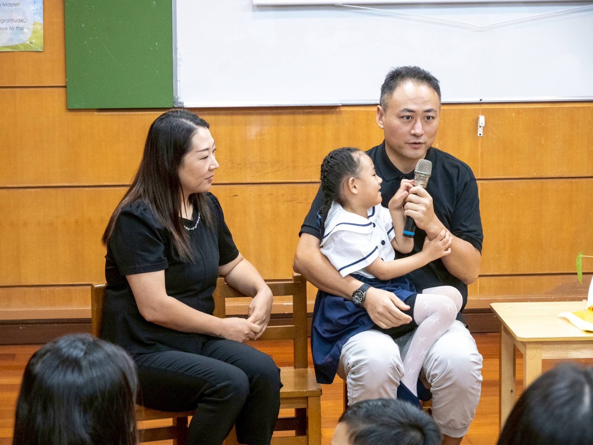 Mingjian and Huanhuan Zhang, parents of Athena, said that despite their recent relocation from China to the Philippines, their child has adjusted well and enjoys going to school.