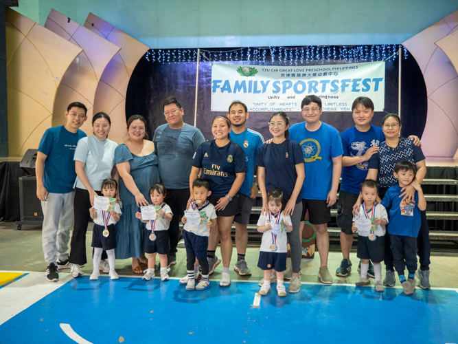 Team Blue Dolphins happily receive recognition, winning as first runner-up in the sports fest.