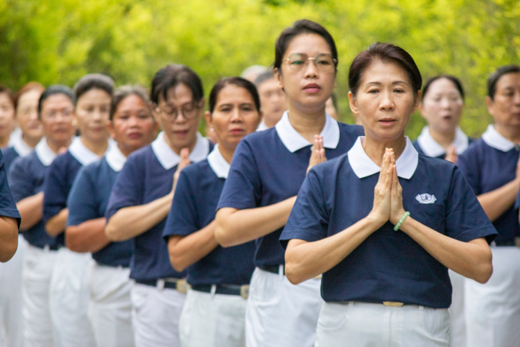 As dawn breaks after the evening ceremony, Tzu Chi volunteers and guests participate in a walking meditation at the BTCC, embracing mindfulness to start the New Year.