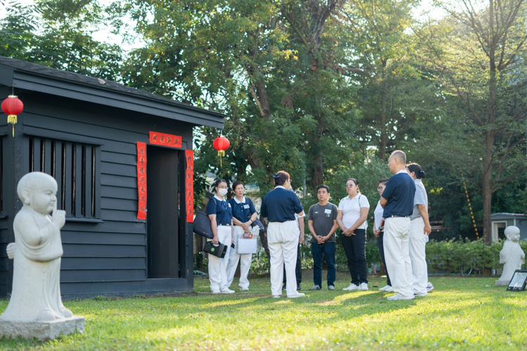 A tour of BTCC on Day 2 brings camp participants to replicas of the wooden cabin where Master Cheng Yen spent her early years, the Jing Si Abode, and Jing Si Auditorium.