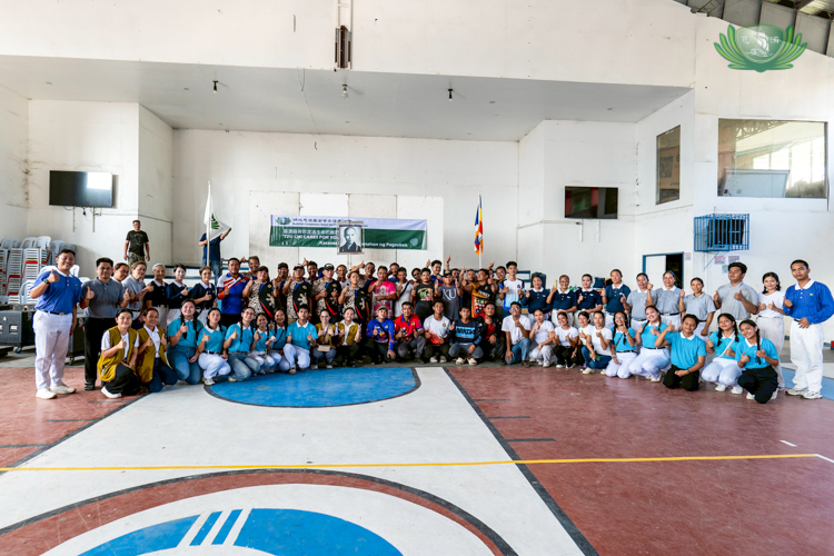 Volunteers assigned to Opao, Mandaue, pose to celebrate the success of the relief distribution. 
