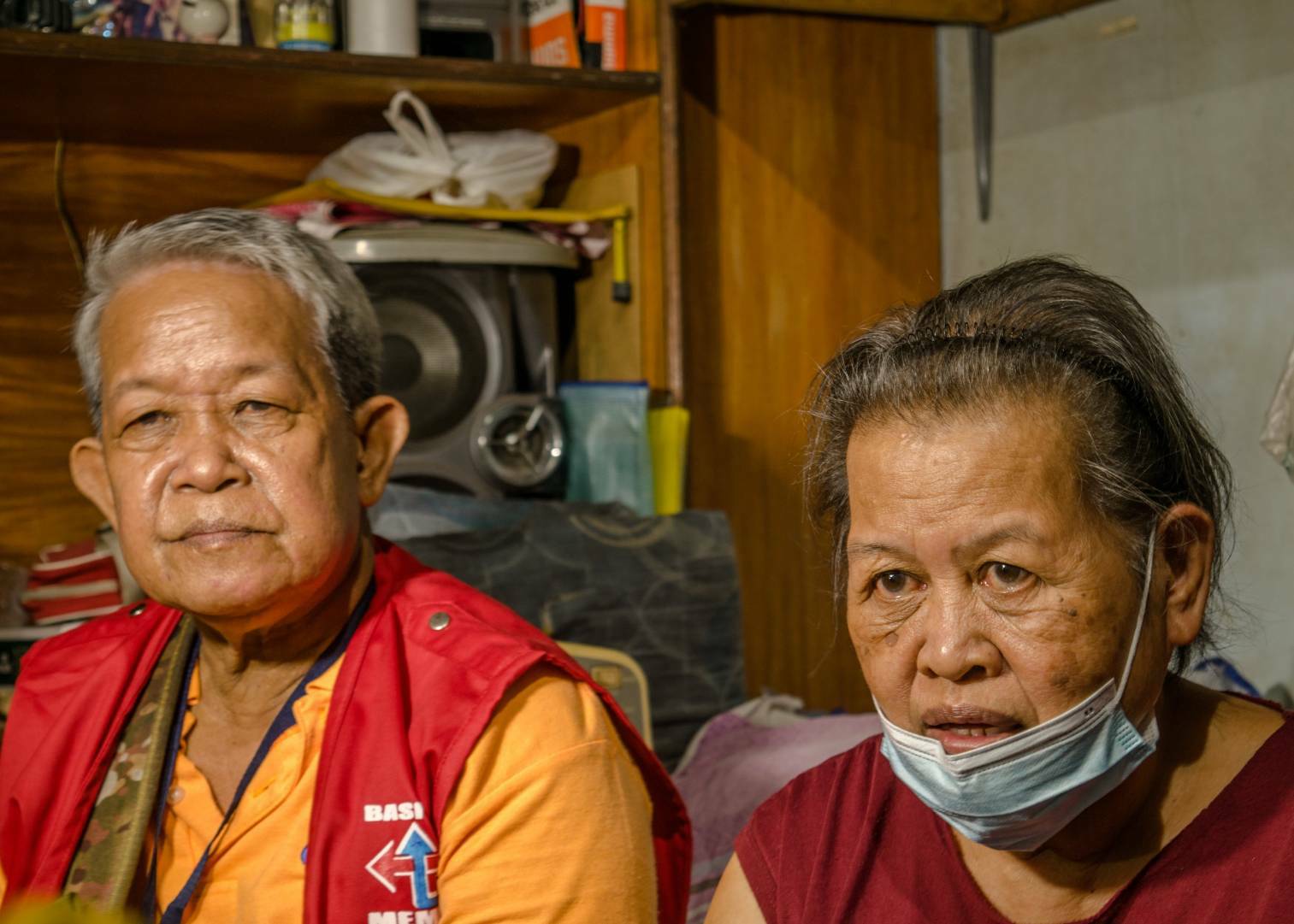 Tricycle driver Domingo Navida (left) and his wife Constancia have been setting aside their extra earnings for years. 【Photo by Don Lopez】