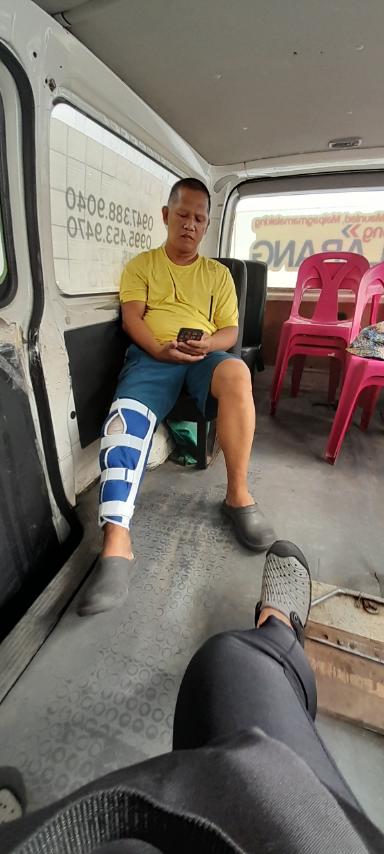 At the Philippine Orthopedic Center, a brace and cast kept his right leg stable. 