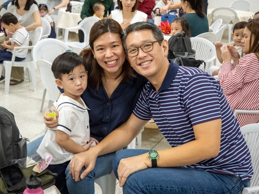 Joy and Regan Pacheco take a happy photo with their son Regan Lucas (first from left).